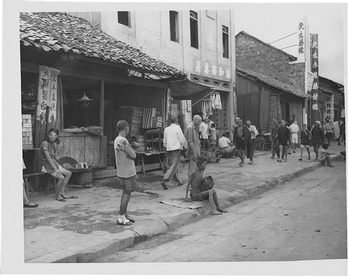 A Chinese farmer quietly starves in the streets of Hengyang, Hunan Province, where he has come to find food in 1945.